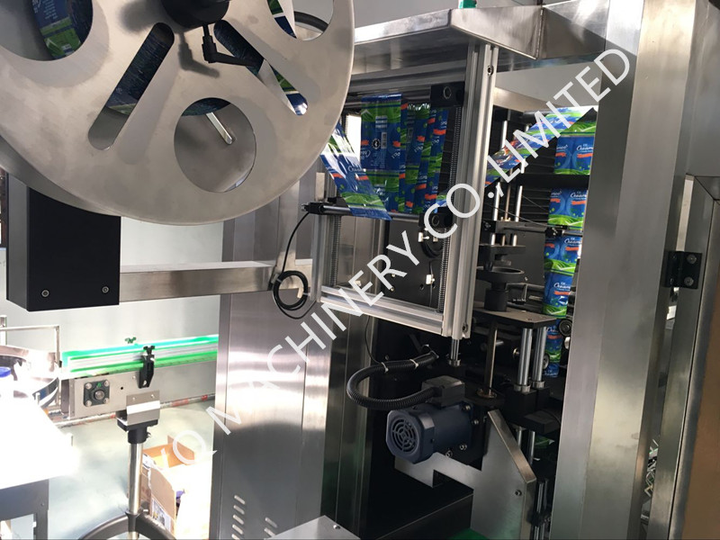 sleeve labeling machine.jpg sleeve labeling machine.jpg