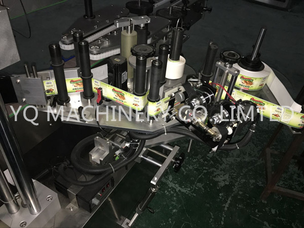 LABELING MACHINE FOR DATE PRINTER LABELING MACHINE FOR DATE PRINTER