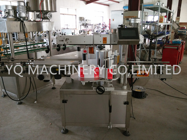 twin sides labeling machine