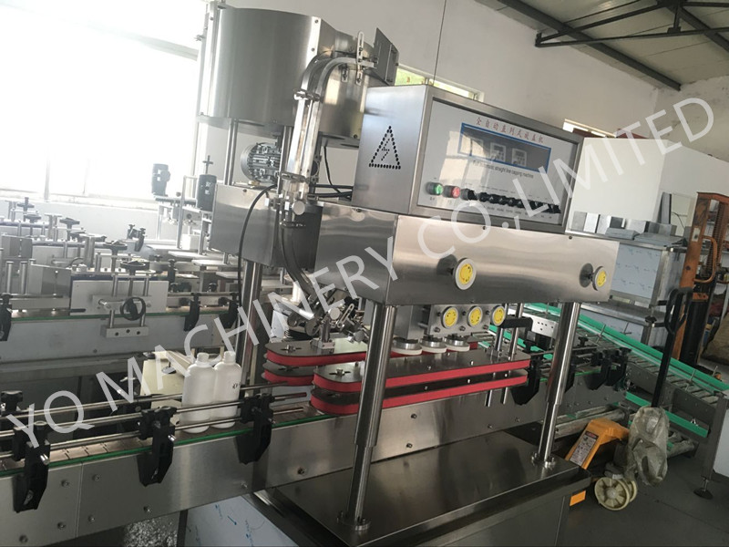 lid screwing machine.jpg