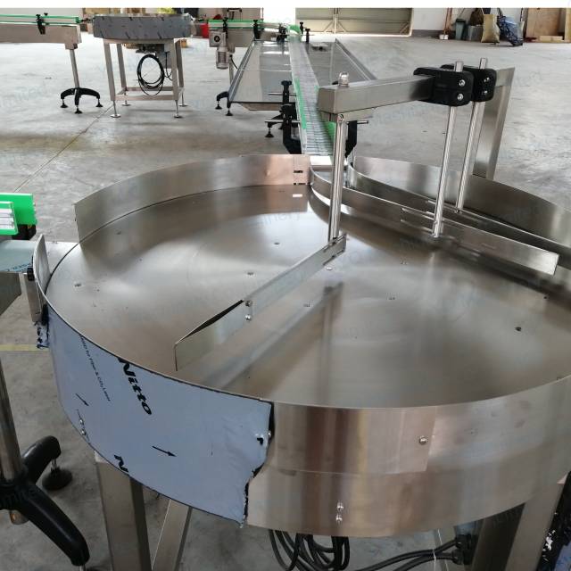 Perfume filling machine 10