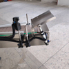 Top Labeler with Turnover Device