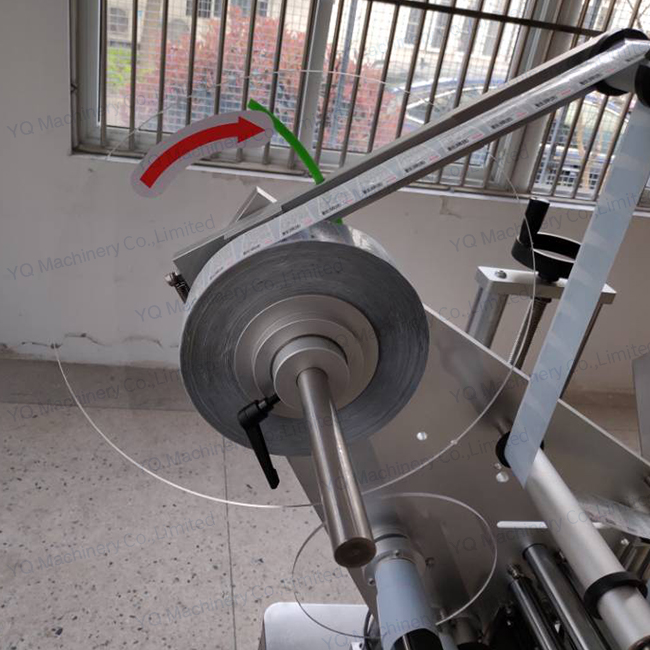 Top Labeler with Turnover Device