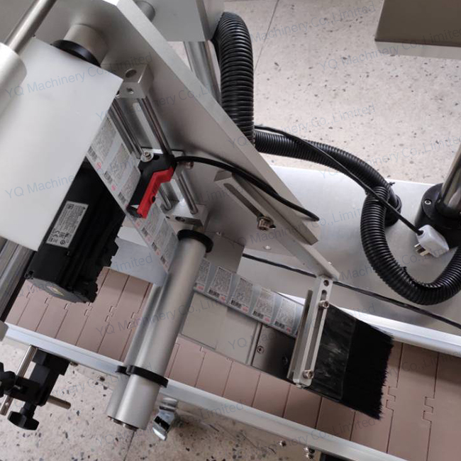 Top Labeler with Turnover Device